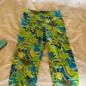 Stretch side zip, multi colour ankle length pants.